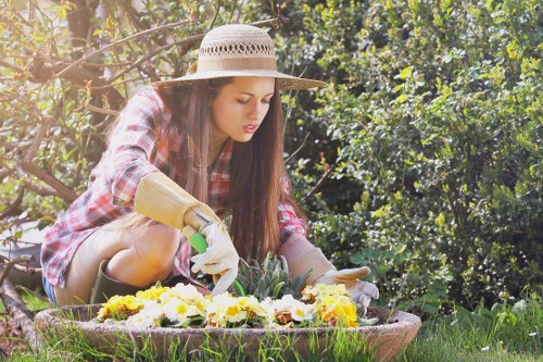 Professional gardener addressing a service issue